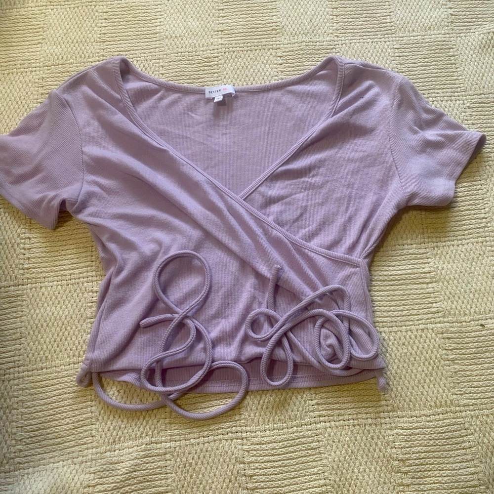 Purple shirt with string on both sidess